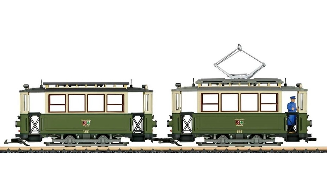 Modell eines Oldtimer-Straenbahntriebwagen mit Anhnger in der typischen Epoche III (1949-1970). Farbgebung der Nrnberger Straenbahn (Straenbahn Nrnberg-Frth). Das Fahrzeug ist komplett authentisch bedruckt und mit MZS-Decoder ausgerstet. Des Weiteren sind beide Achsen angetrieben, 1 Haftreifen montiert, Mehrzwecksteckdosen und eine vierstufiger Betriebsartenwahlschalter eingebaut. Spitzenbeleuchtung am Triebwagen wechselnd mit der Fahrtrichtung. Kabel zur elektrischen Verbindung des Motorwagens und des Anhngers liegt bei. Im Museumsbestand befinden sich heute die Beiwagen 1251, 1252, 1258, 1278 und 1304