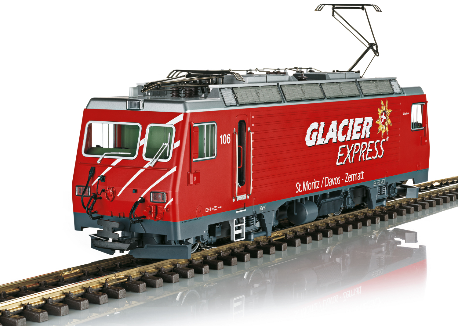 LGB Art. Nr. 23101 - HGe 4/4 II "Glacier Express". Modell der Elektrolok HGe 4/4 II der Matterhorn-Gotthard-Bahn, wie sie heute noch im Einsatz ist. Originalgetreue Farbgebung und Beschriftung der Epoche VI, Sonderlackierung passend zum Glacier-Express. Alle 4 Radstze und zwei Traktionszahnrder von zwei leistungsstarken kugelgelagerten Motoren angetrieben. Ausgerstet mit einem mfx/DCC-