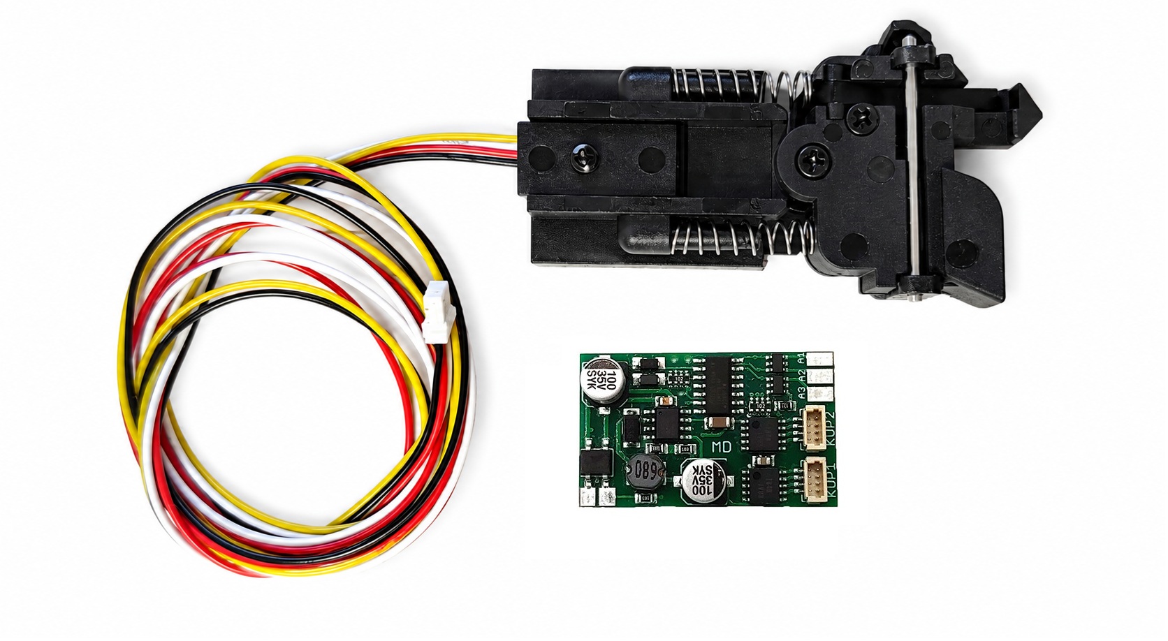 Die neue elektrische Lindenbergkupplung mit der DSP Steuerung. Diese kann analog (Decoder integirert) oder �ber einen bereits in eine Lok oder Wagen eingebauten Decoder erfolgen. 