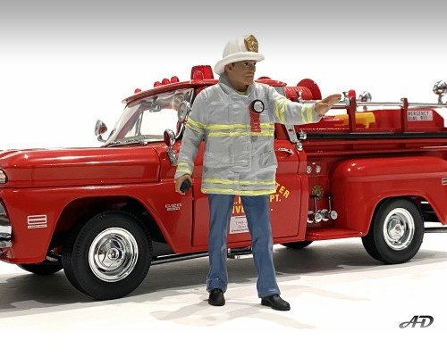 US-Feuerwerhrmann - Art. Nr. 76418 - Fire Captain - In feuerfester grauer Jacke mit gelben Streifen gibt der Feuerwehrkommandant Anweisungen an sein Team. Helm und Lampe an der Jacke gehren zur Ausstattung. 
