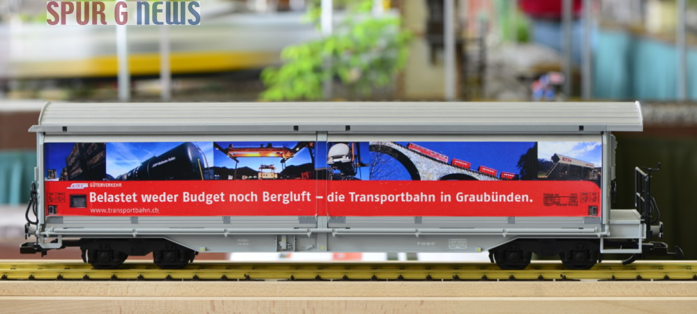 Werbeslogan der RhB - Belastet weder Budget noch Bergluft - die Transportbahn in Graubnden. Haikqq-tyz 5171 von Clubmitgliedern gestaltet. 