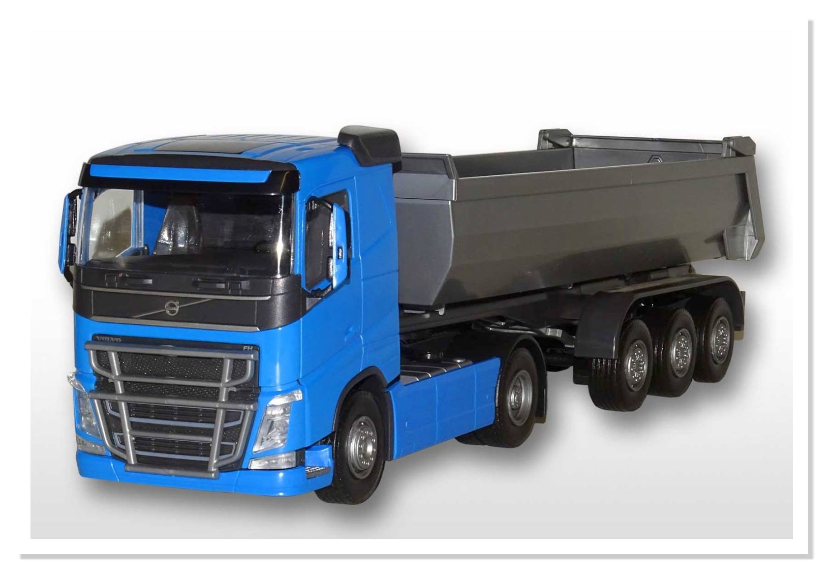 Volvo FH NEU 2/3achs Kippauflieger, blaues Fahrerhaus und silberner Krper. 