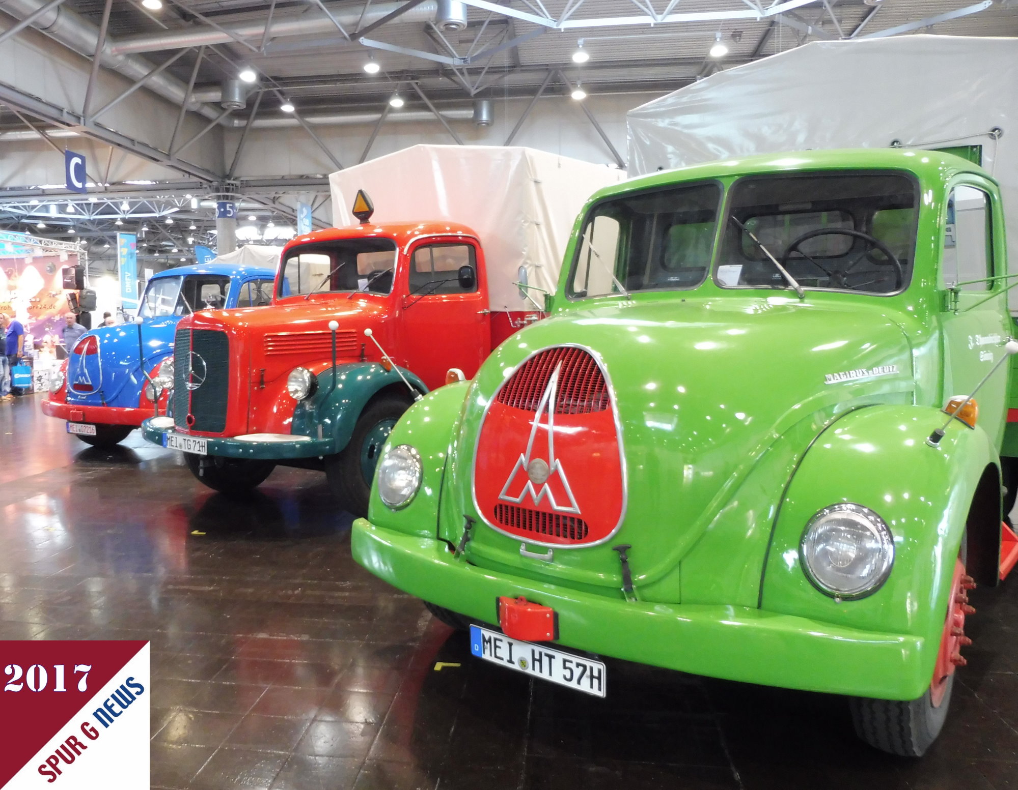 Derzeit nur in 1:1 und als Oldtimer auf der modell hobby und Spiel in Leipzig ausgestellt: Magierus Deutz Nostalgie LKW, so genannte HAUBER und der Feuerwehrrote Mercedes Benz Planenwagen wrden sich auch gut im Mastab 1:24 oder 1:225 auf den Gartenbahnanlagen machen.