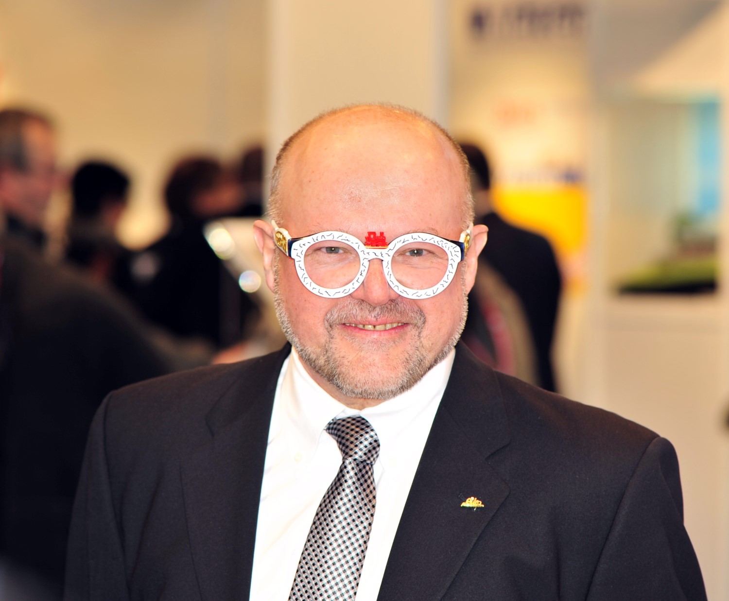 Herr Dr. Ren F. Wilfer - wie immer mit neuer Brille auf der internationalen Spielwarenmesse 2015 in Nrnberg. 