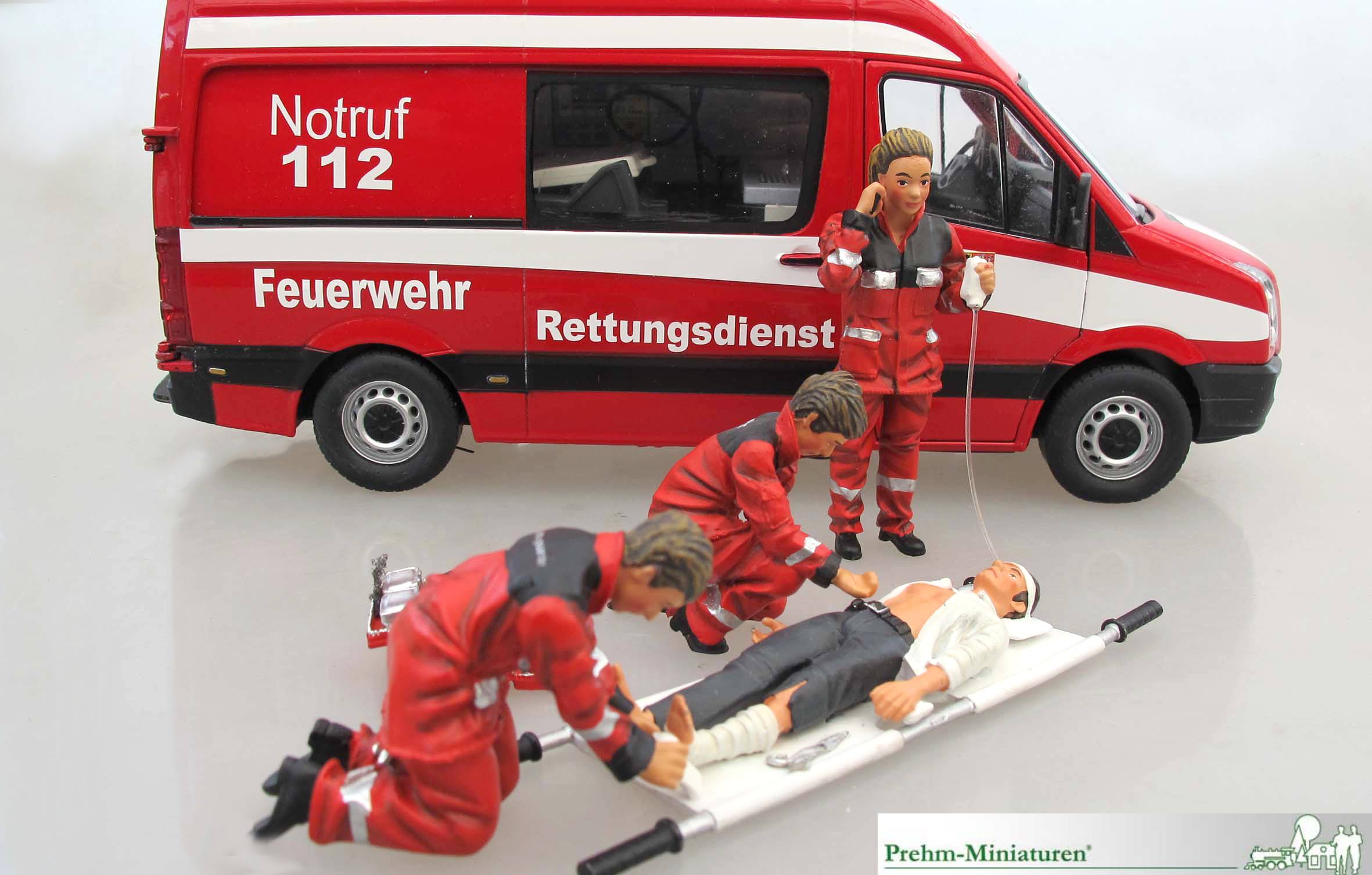 Art. Nr. 500300 - hier mit: Art. Nr. 500133 Medi-Set - zwei Sanitter, Notarzt und verletzte Person auf Trage.