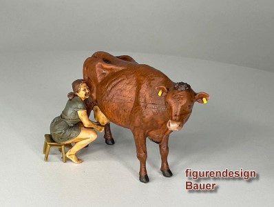 Neue Szene von figurendesign Volker Bauer: Melkerin mit Braunkuh