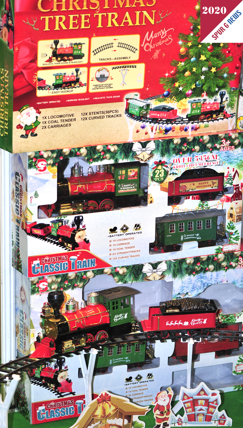 Bei einigen Herstellern wird schon an Weihnachten gedacht. Bereits das zweite Jahr auf der Spielwarenmesse in Halle 7A - Stand F32 ist die Firma Fantasia Toys Pagoulatos Christos, aus Kefalonia, Griechenland. Hier werden auch Eisenbahnen angeboten. Das Christmas Tree Train Set besteht aus Mogul Lok, Tender, Wagen und sogar Kunststoffschienen mit Stützen. Hier kann dann rund um den Weihnachtsbaum die Bahn - batteriebetrieben - Ihre Runden drehen. Dies ist eher etwas für Einsteiger oder als Kinderbahn.